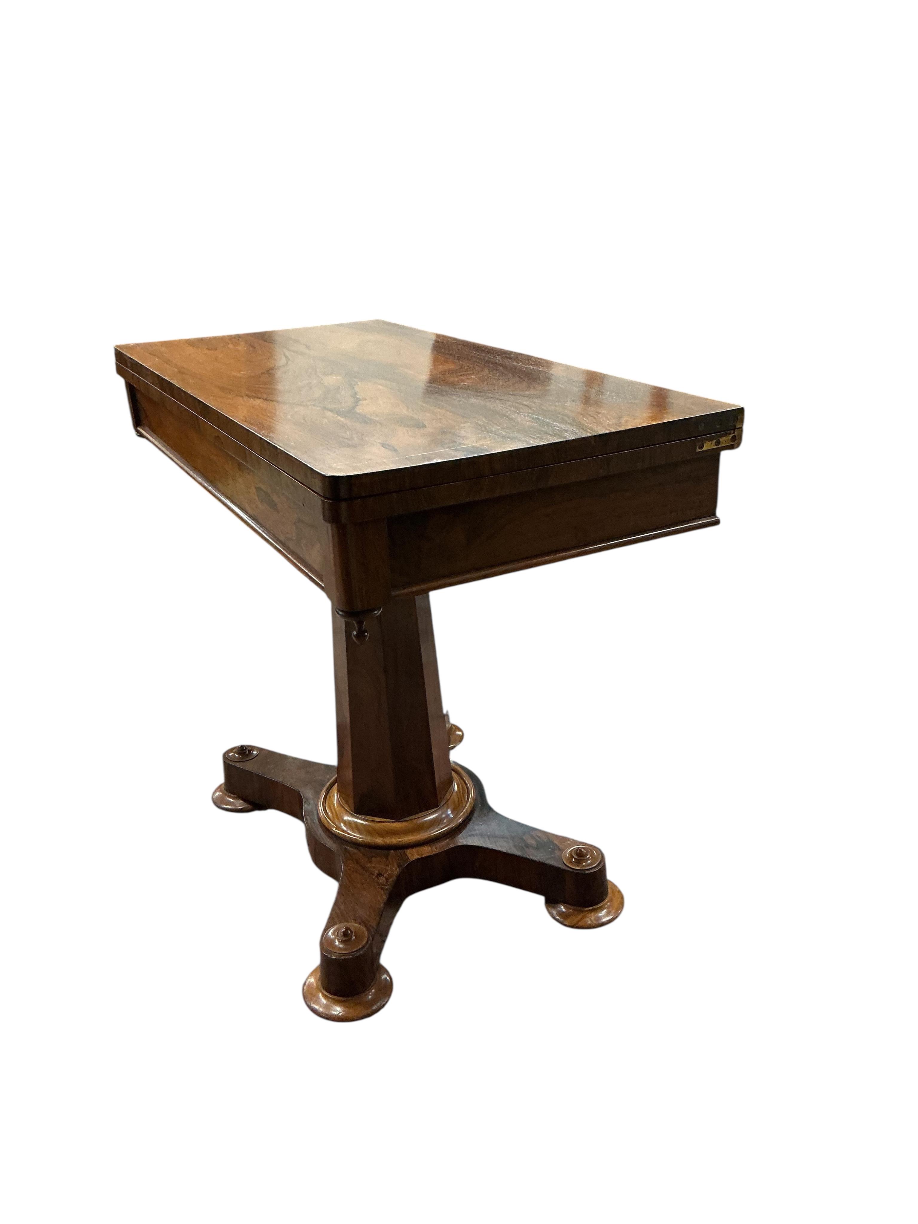 An early Victorian rectangular rosewood folding card table, width 91cm, depth 45cm, height 77cm